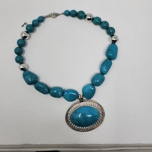 Chunky silver tone necklace with turquoise faux stone statement necklace